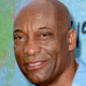 John Singleton arrives at the premiere of FX’s “Snowfall” Season 2 on July 16, 2018 in Los Angeles, California.